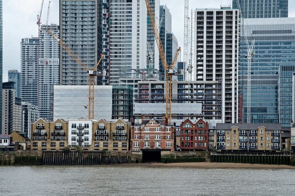 How does gentrification impact real estate investments?